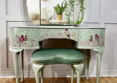 Green dressing table with pink birds design