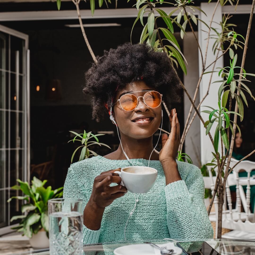 Woman listening to music in a calm space